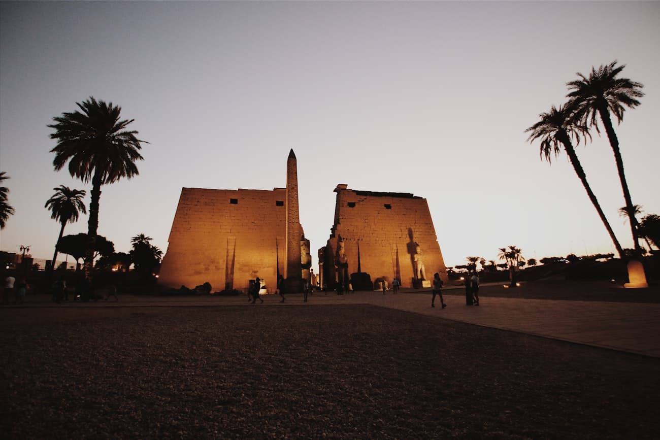 Sandstone columns and carved reliefs at Karnak Temple